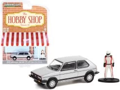 1976 Volkswagen Golf MkI GTI Silver Metallic And Race Car Driver Figurine "The Hobby Shop" Series 11 1/64 Diecast Model Car By Greenlight